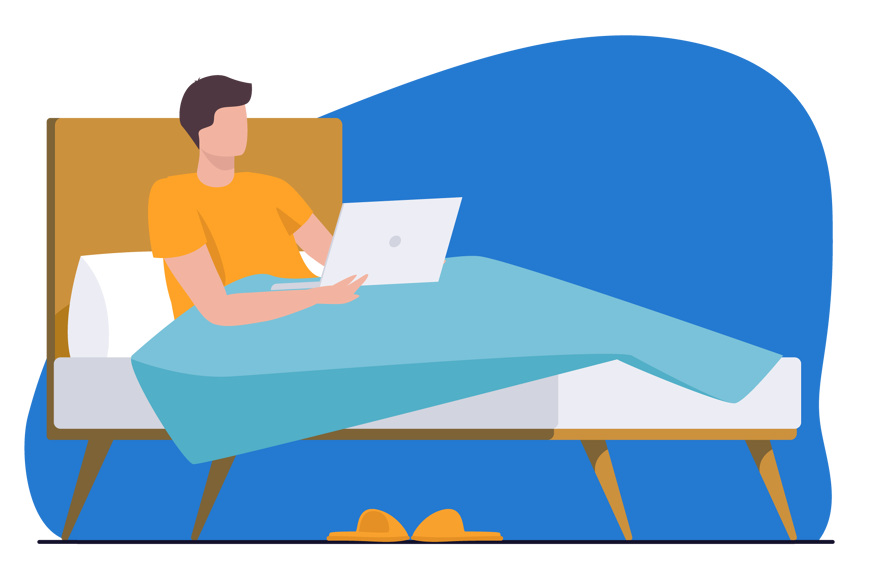 man in bed met laptop
